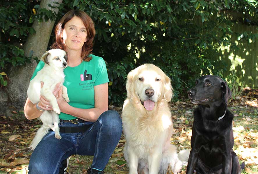 an image of Kiri Downes with her dogs