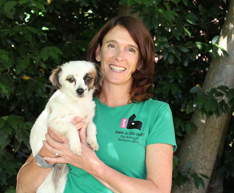 a picture of kiri downes holding a dog